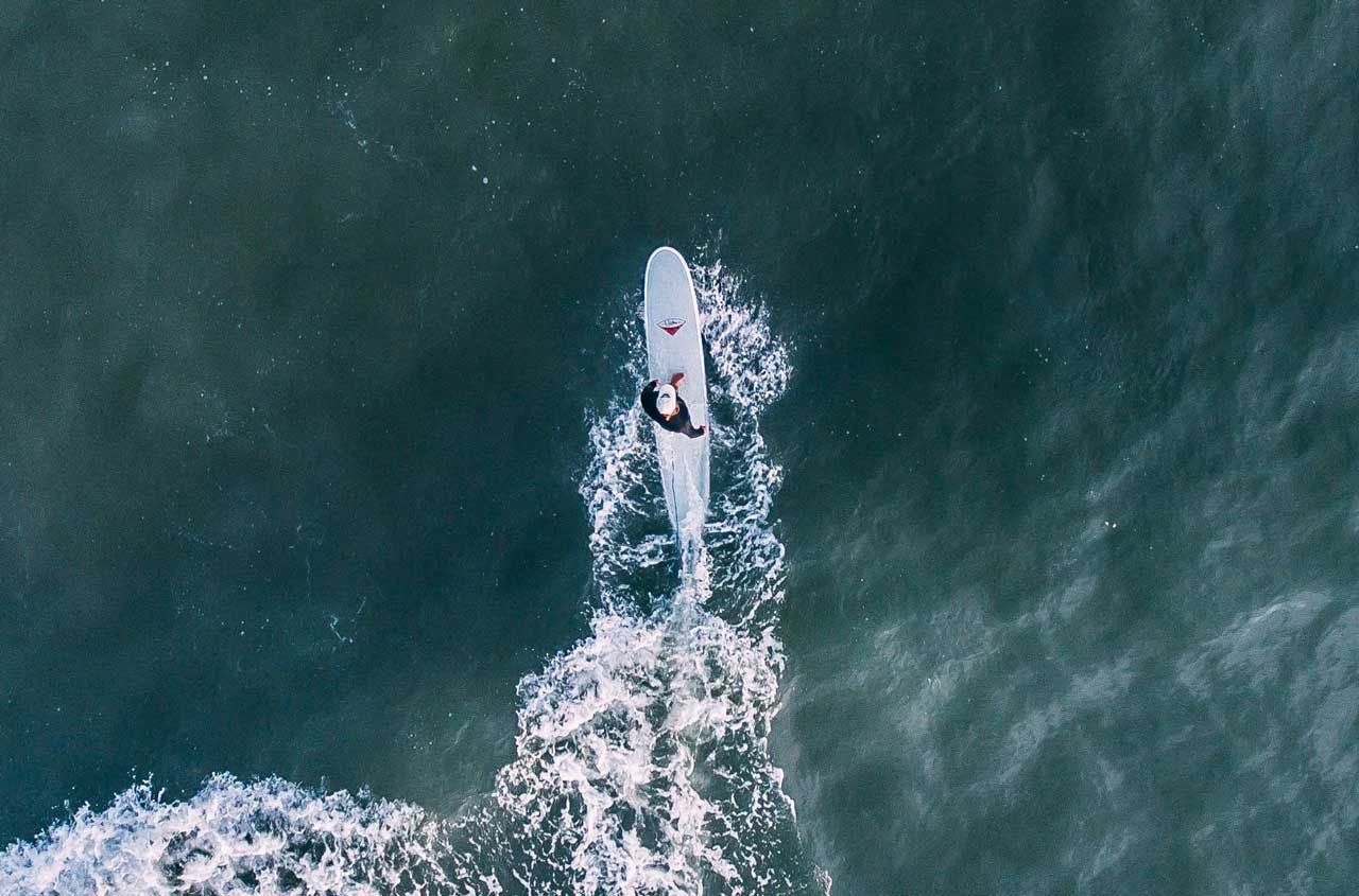 longboard surfer top